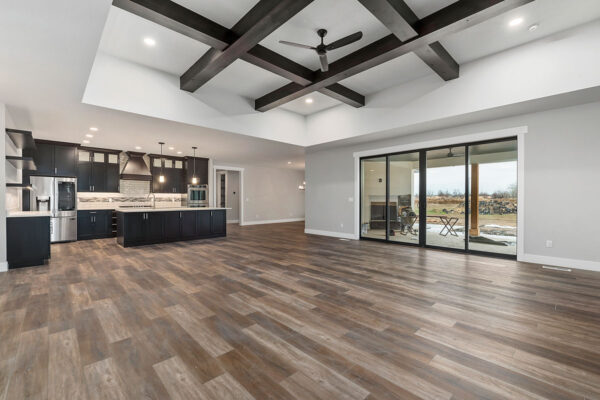 large hardwood floor living room in new custom home