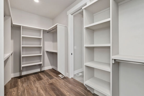 large white closet in custom home