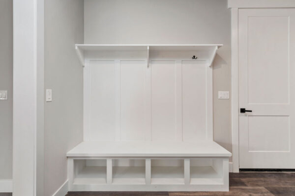 white storage shelves in custom home