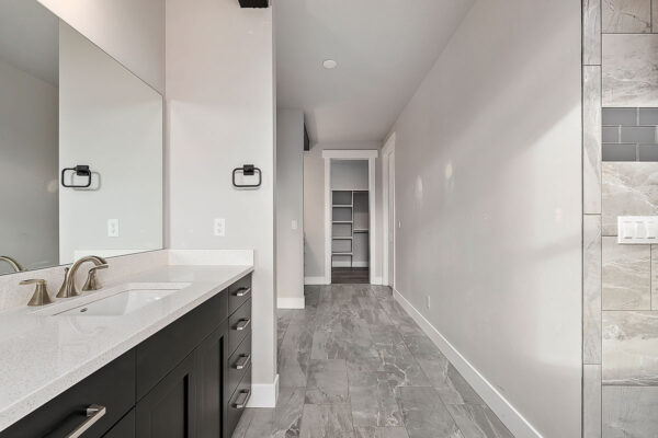 custom home modern bathroom with grey tile