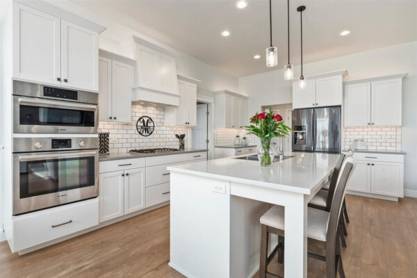 bright kitchen with white cabinets